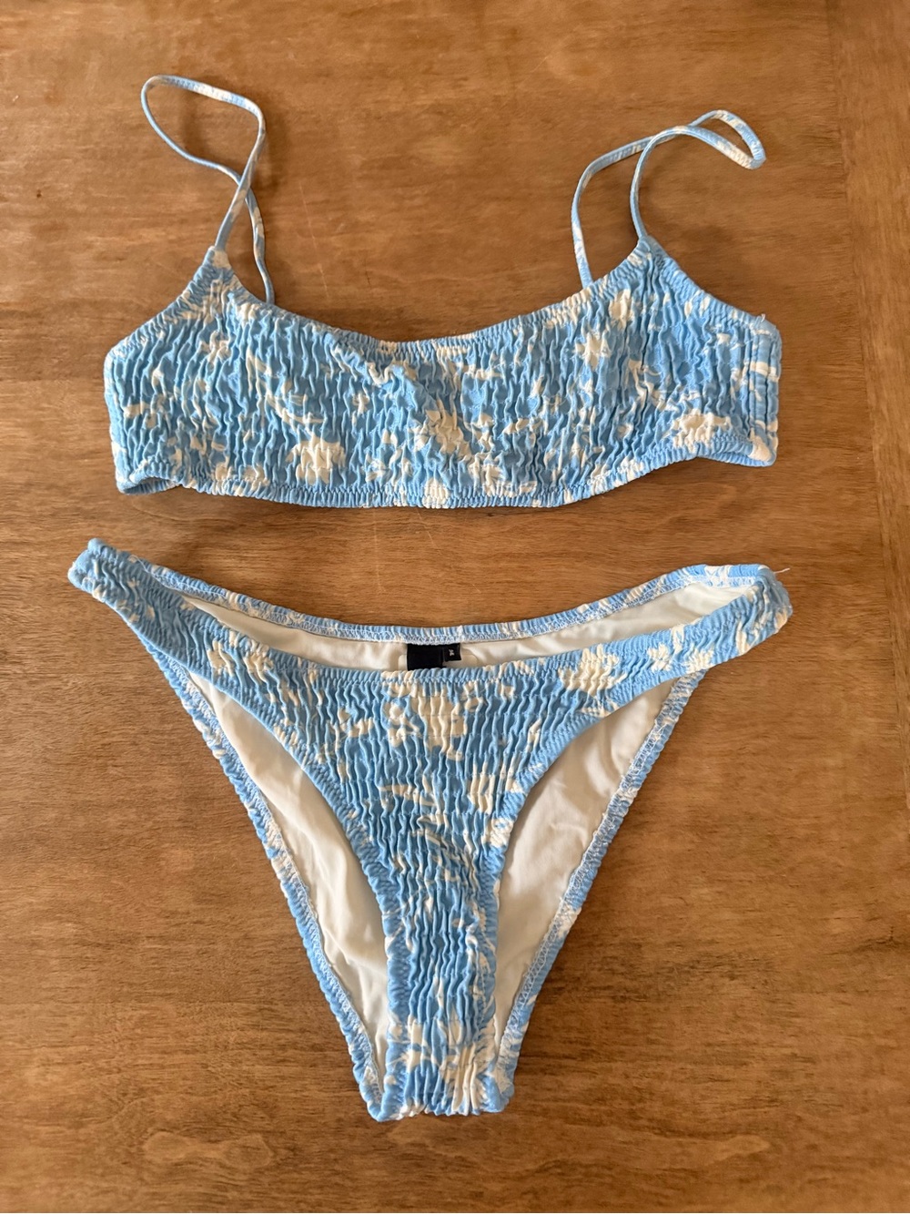 Triangl bikini- Light Blue Smocked Bikini Set with White Floral Accent- XS/s